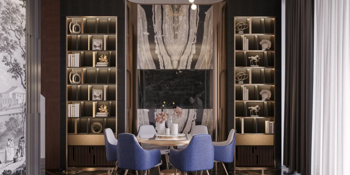 Upscale dining room by Sumessh Menon Associates featuring blue upholstered chairs and a dramatic book-matched marble feature wall.